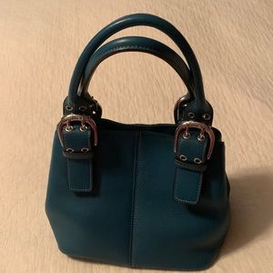 Tiganello teal handbag.